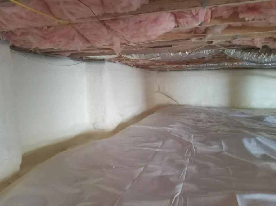 Crawl space encapsulation with closed-cell spray foam for Commercial Roof Restoration in Trenton